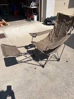 Camping chair with leg rest