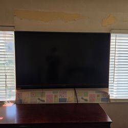 60 in tv with remote and wall mount. No stand