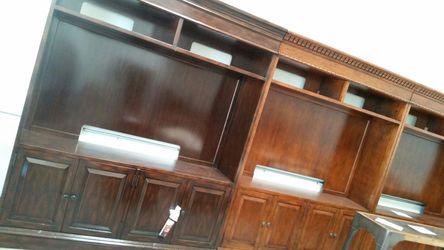 New artistica wood Entertainment center 285