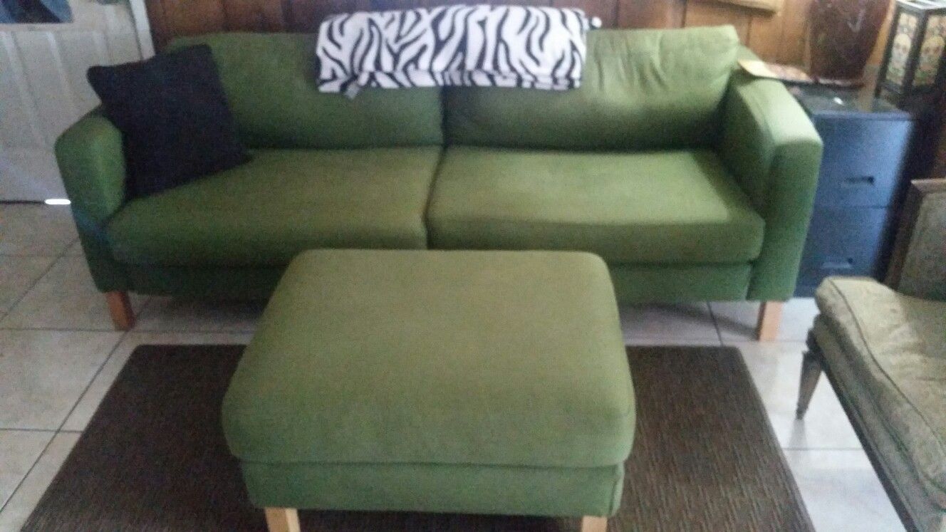 Green couch and ottoman