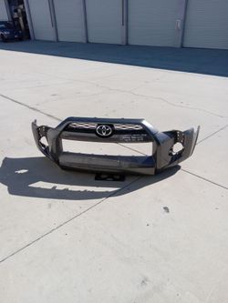 14 to 18 front bumper and grille toyota 4runner  ( oem)