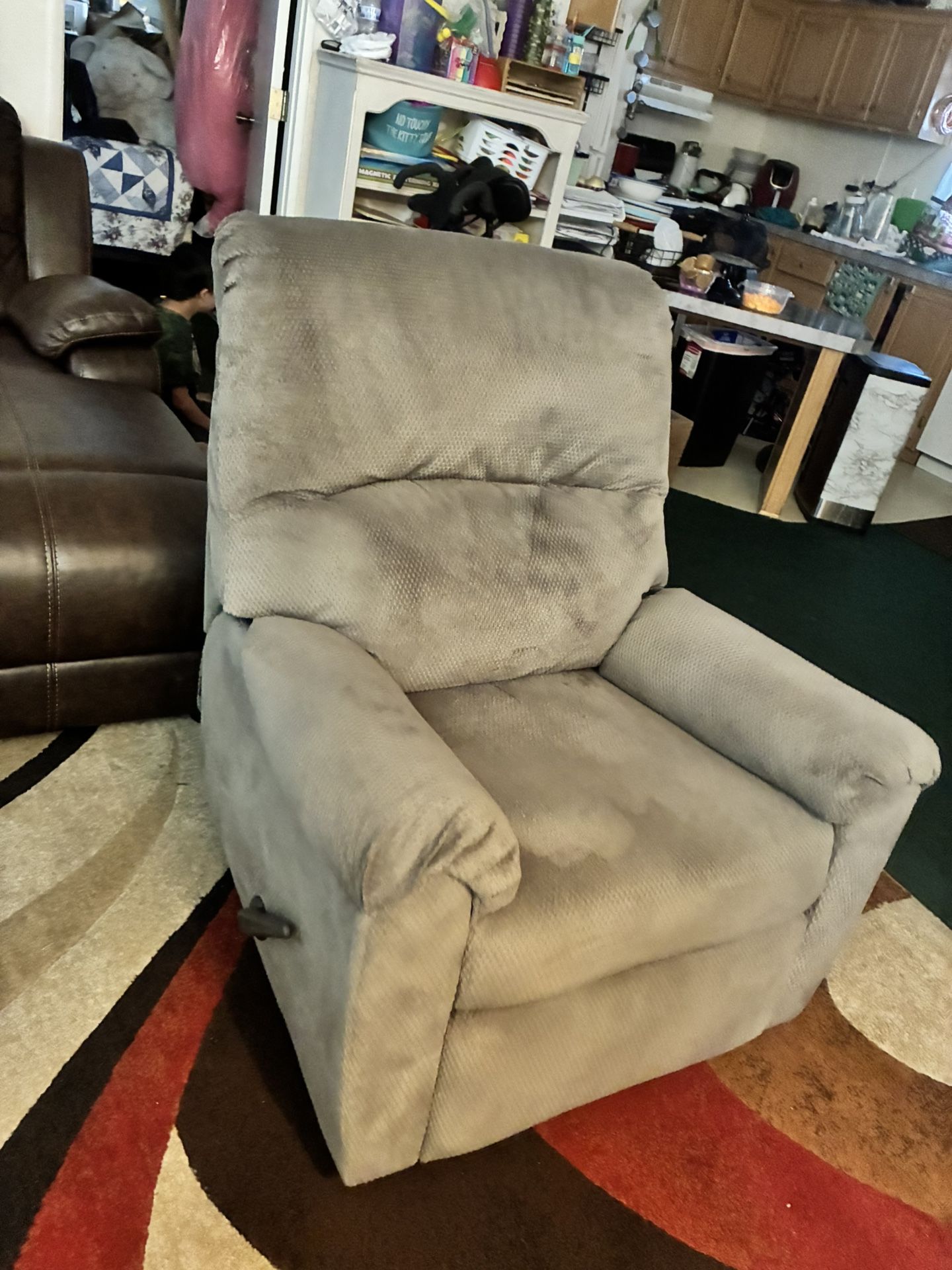 🥰🥰$$170-rocker/swivel grey colored recliner (absolutely everything works on it )comes from a doggie friendly non smoking non pest home. Only sell du