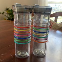 Set-One New And One Just Like New- 2 Large Cups With Lids- Fits In Car Cup Holder And Keeps Record Of Refills With Bands That Can Move Up