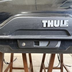 Thule Motion XT XL rooftop cargo and Thule crossbars