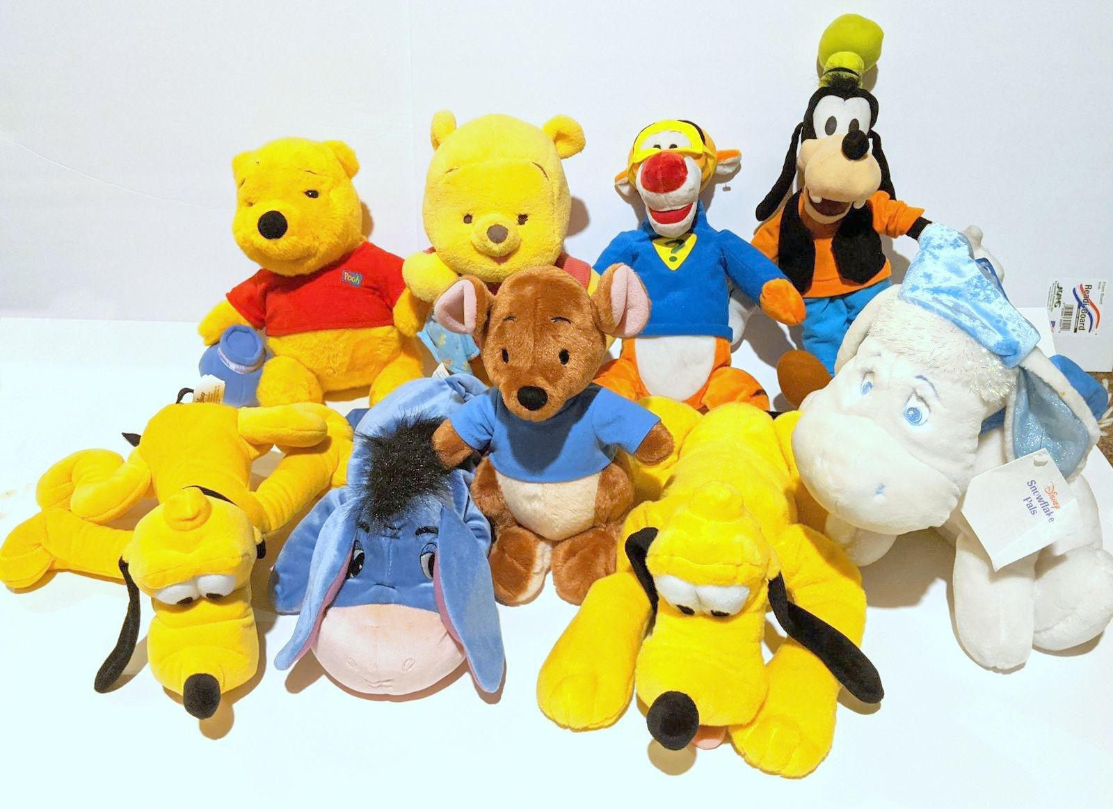 Lot of 9 Disney Characters Plush Winnie Pooh, Tigger, Pluto, Eeyore, Snowflake