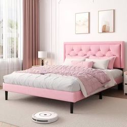 Full size pink bed frame with soft headboard