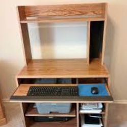 Delivery Avail  1980s rolling wood workstation computer desk 35"x20"   53" high
pull out tray rolling table