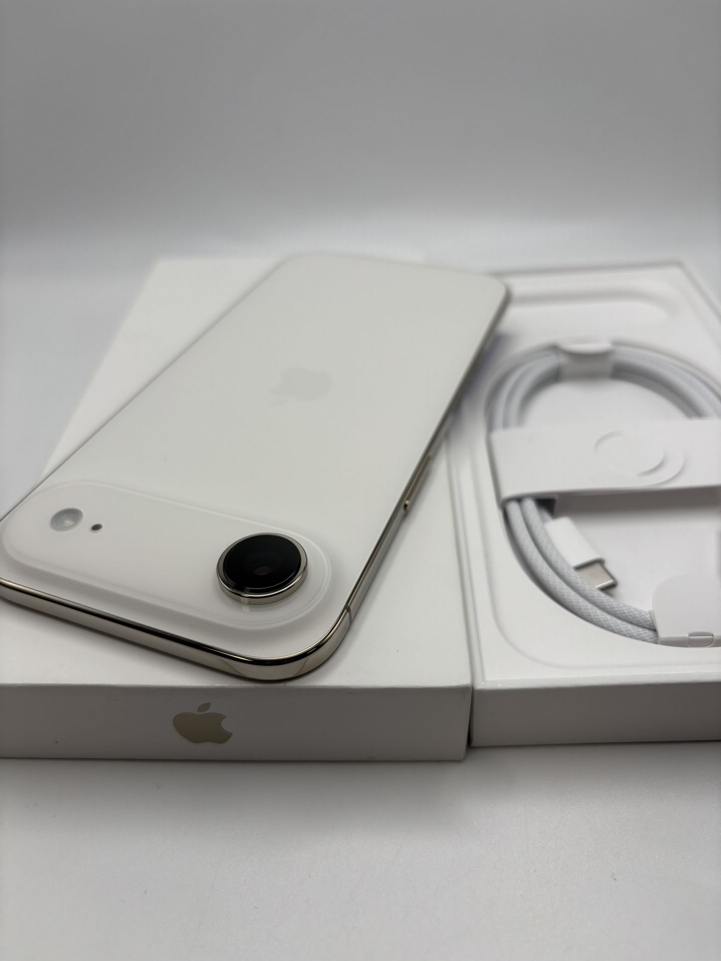 Brand new light gold iPhone air 256gb unlocked for any carrier battery health 100% (0 battery cycles) had apple warranty till 12-19-2026 Was opened to