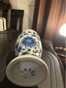 Chinoiserie-style decorative vase with a floral motif