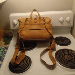 100% Leather Wrangler Backpack cyonvertible messenger bag/backpack, often associated with the Montana West brand. 2024