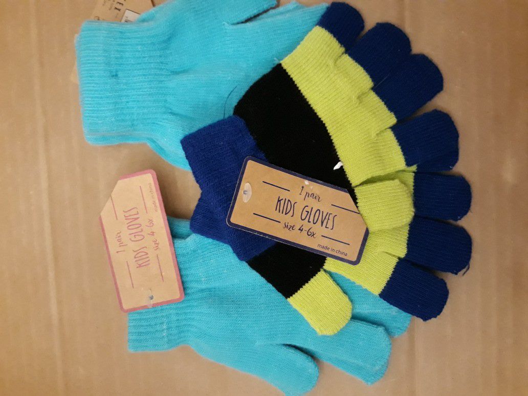 Three pairs of kids winter gloves
