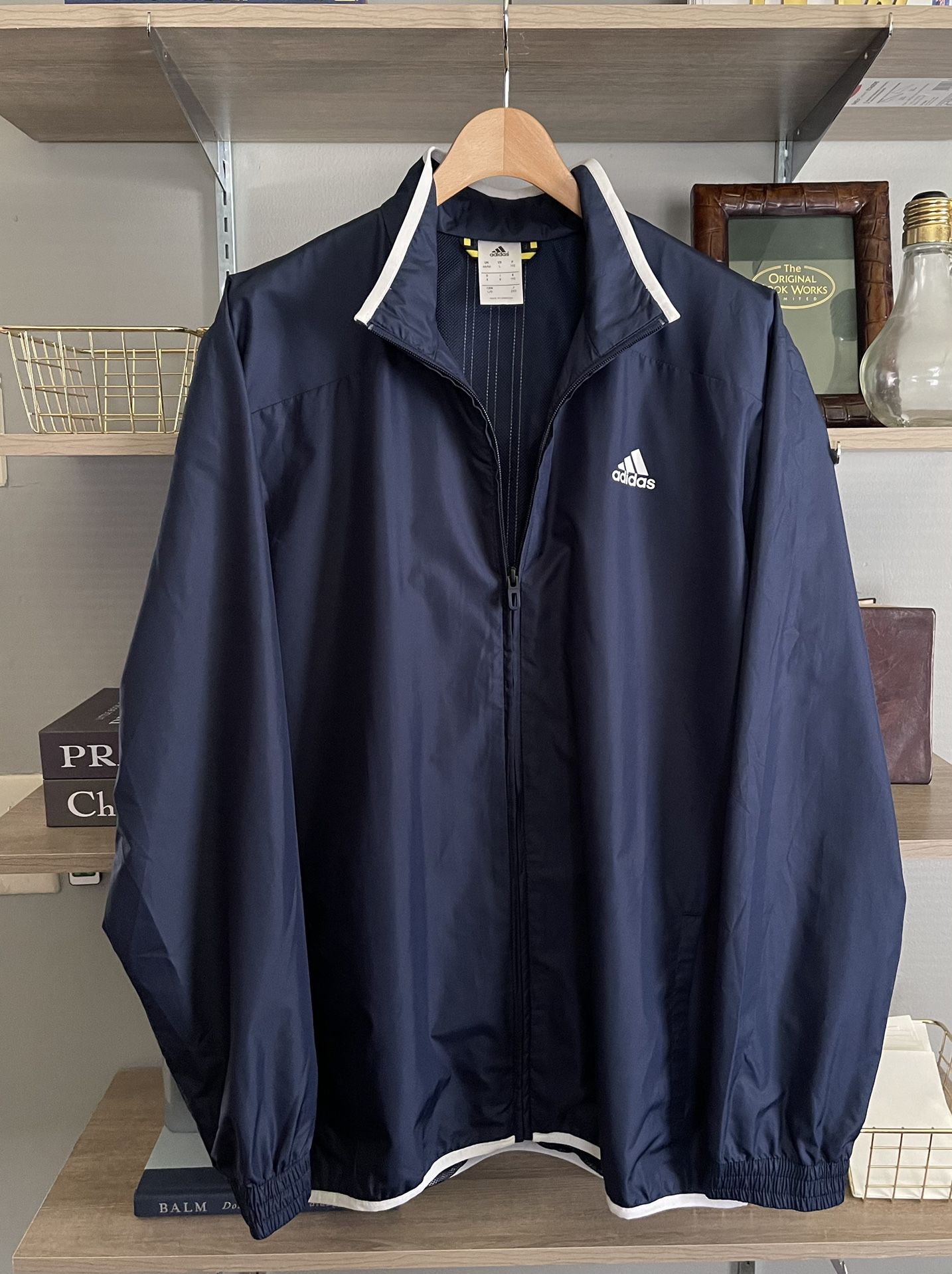 New! Mens Adidas windbreaker jacket size L retail $80 Brand new never worn. With pockets! Color navy blue