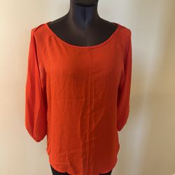 Material girl Chic and bold orange blouse. Perfect for casual or dressy occasions. Comfortable and stylish. Size M Excellent condition  Bin 5