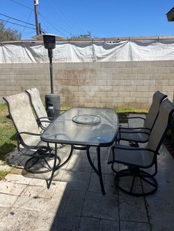 Outdoor Patio Table and 4 Swivel Chairs
