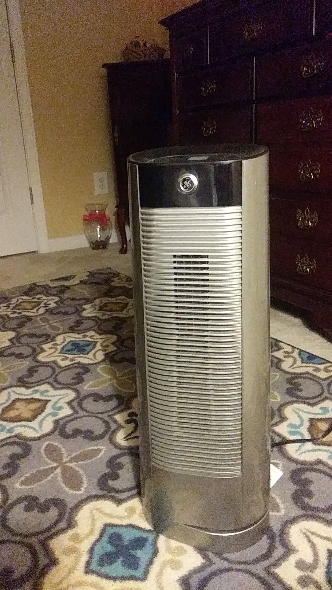2 - Standing Fan & Heater in one. Has different speeds & it oscillates