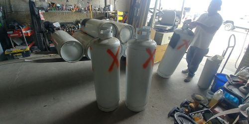 Empty expired gas tanks(good for making bbq grill)