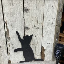 Potting table made of reclaimed cedar with solar lights and cat