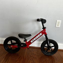 Strider 12 Classic Entry Balance Bike for Toddler Kids 18 - 36 Months Old, Red