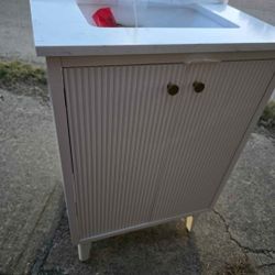 Home Decorators Collection
Sylvie 24 in. Single Sink Fluted Dove Bathroom Vanity with Volakas Engineered Stone Top 
New open box item