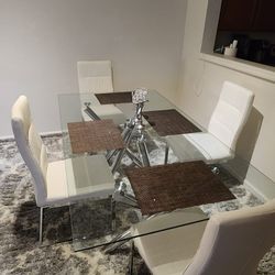 Glass Table With 4 White Chairs