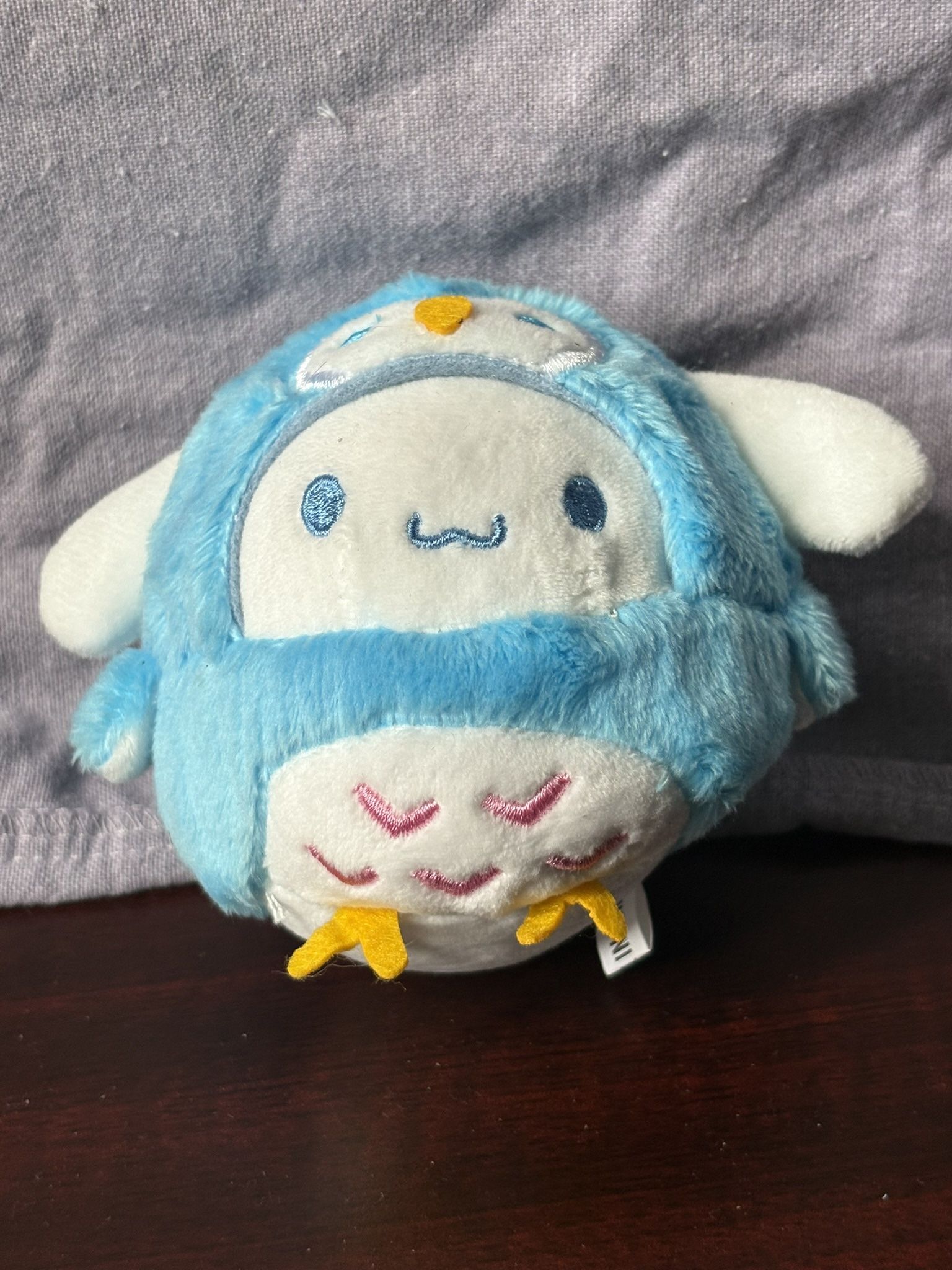 Cinnamoroll bird costume plush keychain.
