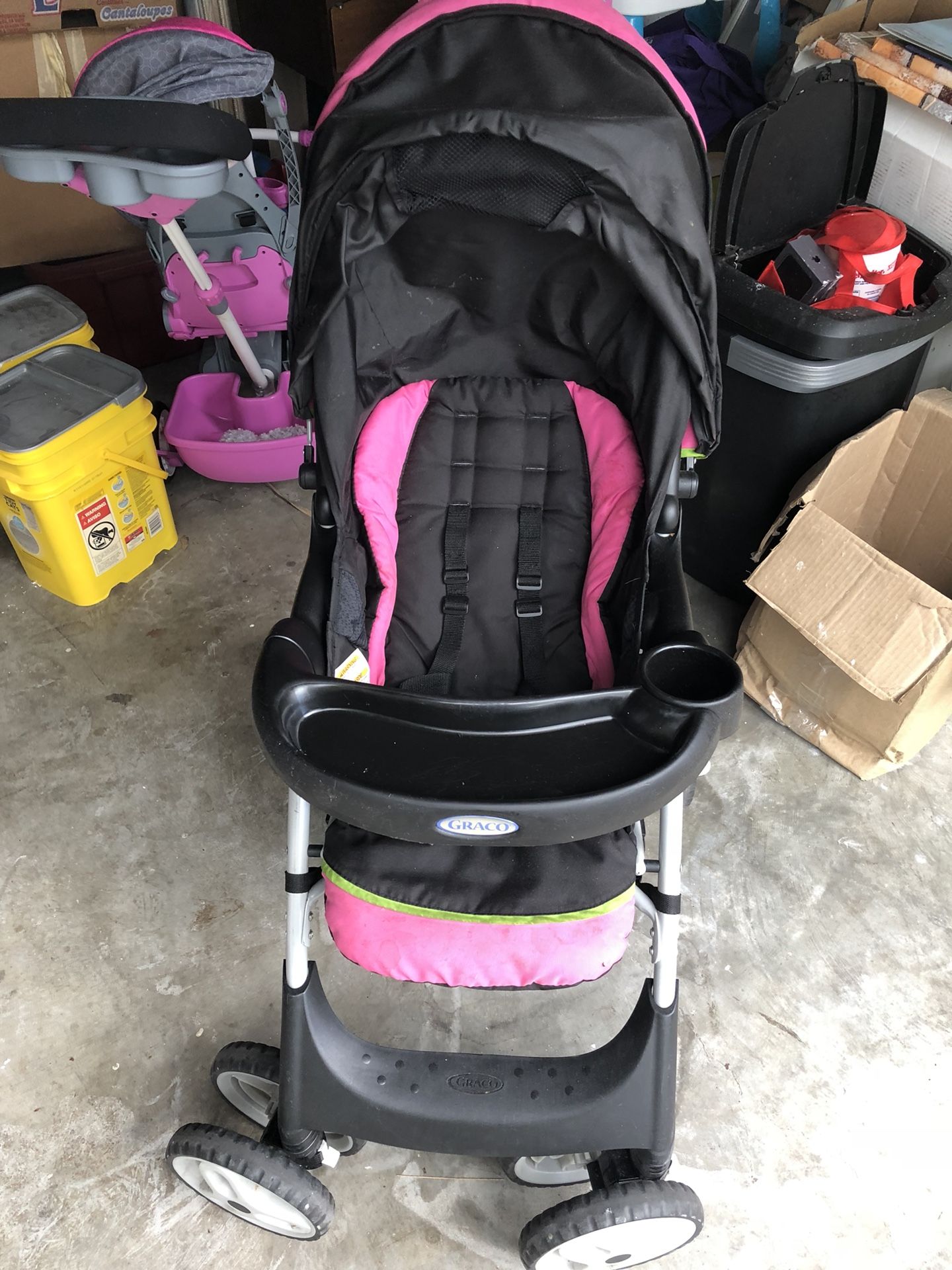 Graco pink and black stroller