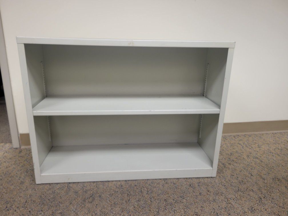 USED WHITE/LIGHT GRAY METAL BOOKCASE $100