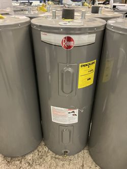 ENERGYGUIDE Rheem Sales Company, Inc. Water Heater - ELECTRIC Tank Size (Storage Capacity): 36 gallons Model PROE40 M2 RH95 M29651