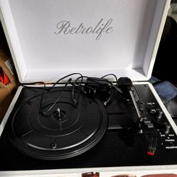 Vinyl Record Player With Bluetooth And Two Small Speakers And RCA Aux Out.