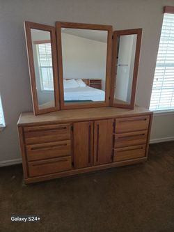 Wood dresser with fold up mirror.e