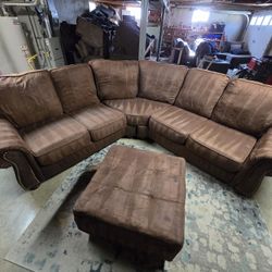 Ashley Brown Microfiber Suede 2-Piece Sectional with Nailhead Accents + Ottoman