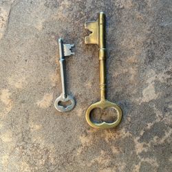 When large brass skeleton key over 5 inches and smaller skeleton, both unique