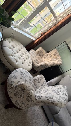 Upholstered swivel 2 chairs and ottoman