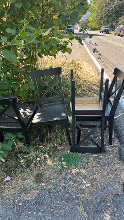 Four black wooden chairs for free