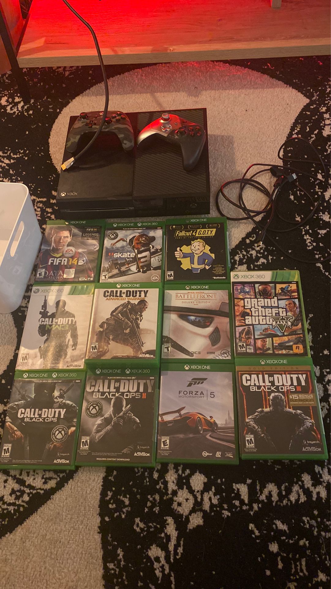Xbox one with 2 hdmi cords, main power cord, and 11 games