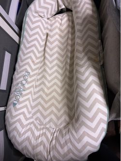 Used Dock A Tot deluxe baby lounger