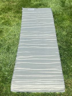 Therm-A-Rest self inflating sleeping pad.