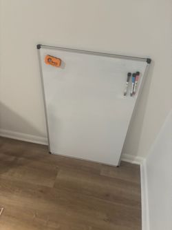 Whiteboard with eraser and markers