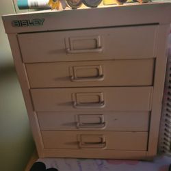 Small pink file cabinet