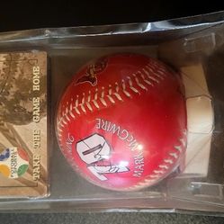 This item is a Fotoball Sports commemorative baseball honoring Mark McGwire's 1998 home run record season. 