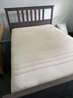 IKEA dark grey full size bed with storage and mattress