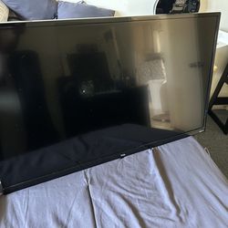24 “ TCL smart tv with wall mount.