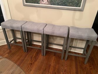 Barstools (4) - Grey upholstered barstools w/wood grey legs