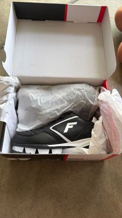 Brand new cleats size 13 youth