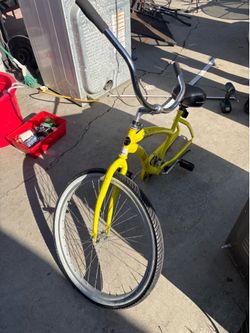 Magna rip curl yellow cruiser bike