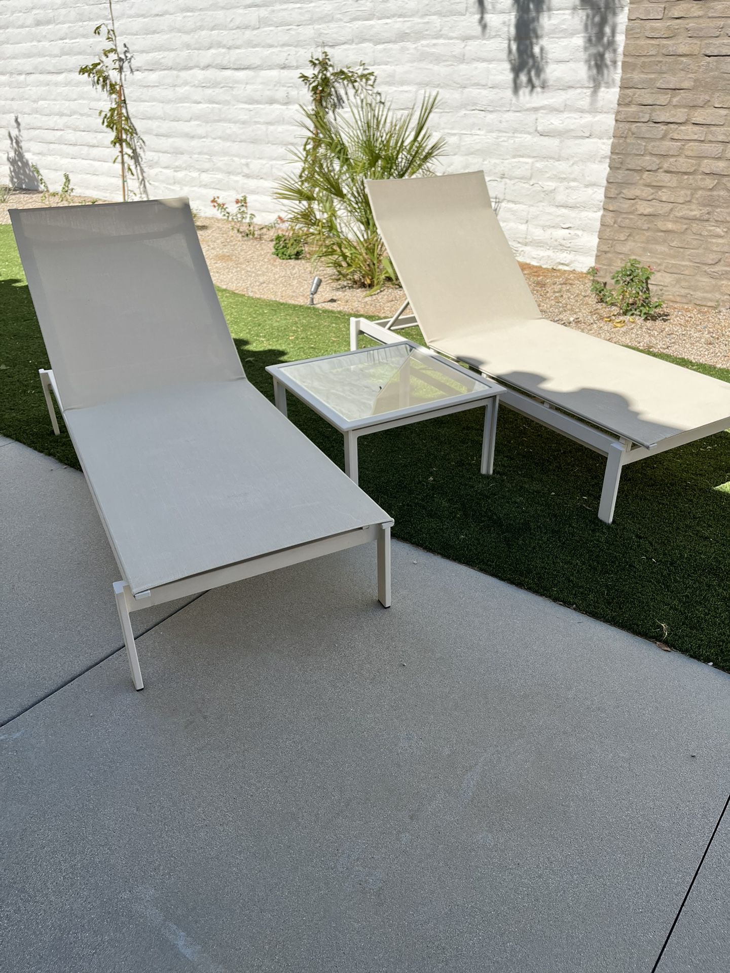 Pair Of Brown Jordan Mesh Chaise, Lounges, And Side Table