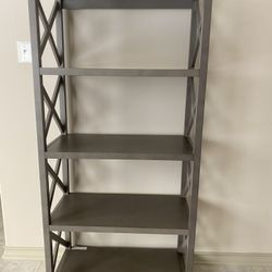 Sturdy 5-tier bookshelf with cross design sides Good condition Pick up in Missouri City 77459 Lake Olympia $200