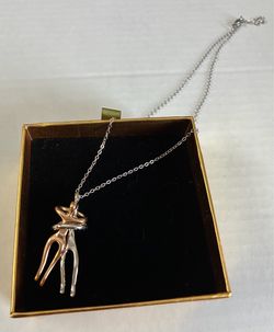 Two-Tone Embrace Figure Pendant Necklace