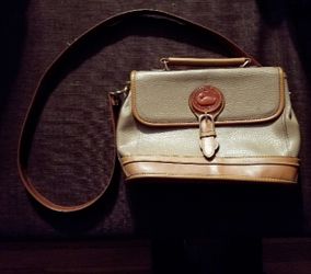 Beige-colored Dooney & Bourke purse