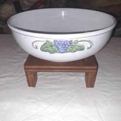 Vintage white serving bowl with grape bunch pattern.
